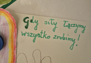 Zdjęcie przedstawia hasło "Gdy siły łączymy, wszystko zrobimy".